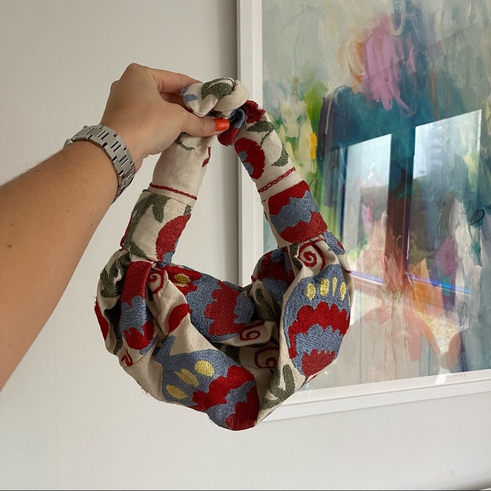 NST Studio embroidered knot bag